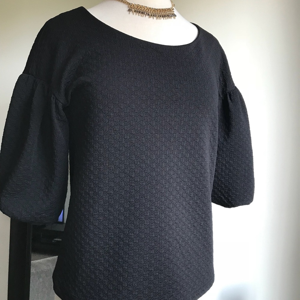 Anthropologie 9-H15 STCL puffy sleeves black top.